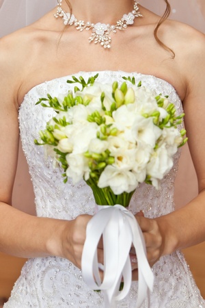 The bride and a wedding bouquetの写真素材