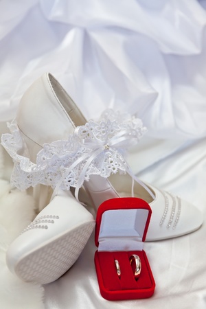 Wedding footwear, garter and wedding ringsの写真素材