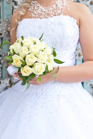 Wedding bouquet in hands of the brideの写真素材