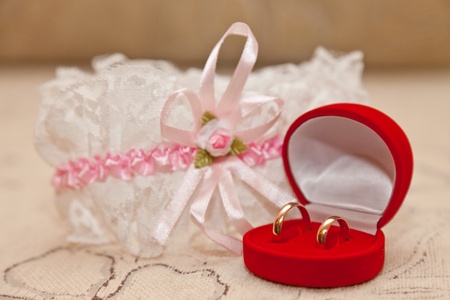 Garter and wedding ringsの写真素材