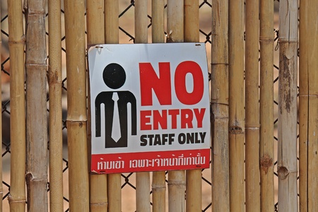 Sign,  in a zoo at Thailand,  tell to tourist are careful.