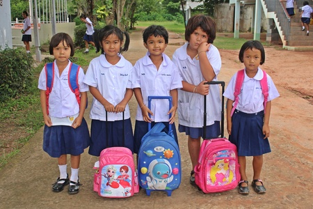 UDONTHANI, THAILAND â JUNE 8, 2018:  Asia girls,  five girls in student uniform stand to line on road in front of school building,  they are happy while stay at their school.のeditorial素材