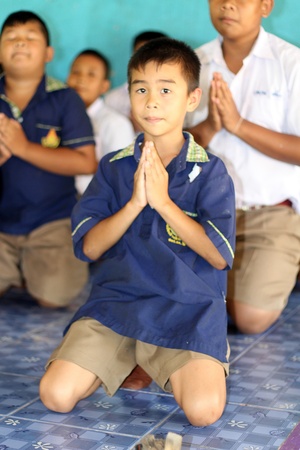 UDONTHANI, THAILAND â JULY 5, 2018:  Asian students,  Asian students are praying to Buddha,  be the practice in afternoon everyday at their school.のeditorial素材