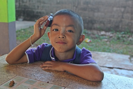 UDONTHANI, THAILAND â AUGUST 4, 2018 :  The Asian child,  he likes to model for take a photograph,  see him at BAN NONG WANG NON KHI LEK school in UDONTHANI province THAILAND.のeditorial素材