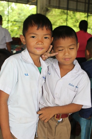 UDONTHANI, THAILAND â AUGUST 4, 2018 :  Two Asian child,  they like to model for take a photograph,  see them at BAN NONG WANG NON KHI LEK school in UDONTHANI province THAILAND.のeditorial素材