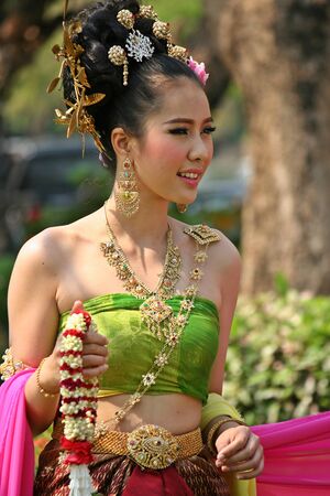 UDONTHANI, THAILAND â DECEMBER 30, 2018:  One woman in THAI RETRO DRESS is posing for a photograph,  see her at UDONTHANI province THAILAND.のeditorial素材