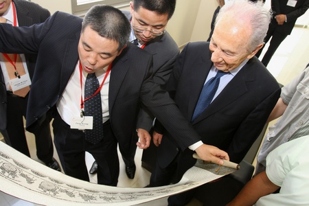 Israel. July 6, 2009. Israeli President Shimon Peres at the opening of an electronic factory with Chinese specialistsのeditorial素材
