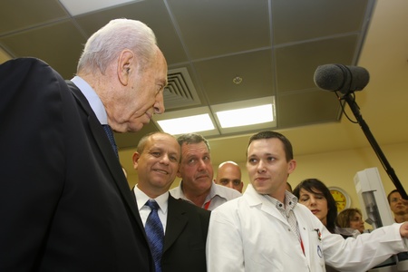 Israel. July 6, 2009. Israeli President Shimon Peres at the opening of an electronic factory with Chinese specialistsのeditorial素材