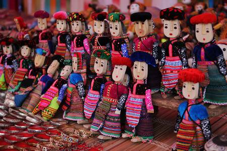 hill tribe dolls in Bac Ha market, Vietnam の写真素材
