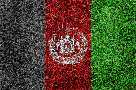 Afghanistan Flag color grass texture backgroundの写真素材
