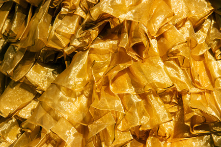 close up gold satin textile texture for background