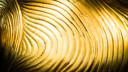 abstract  gold wave line pattern backgroundの写真素材
