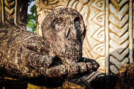 Ancient Buddha hindu style statue at Sala Kaew Ku Nongkhai Thailandの写真素材