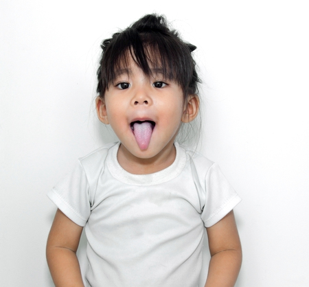 asian girl show her trunk in funny actionの写真素材