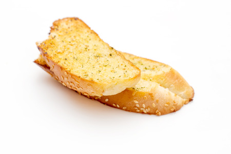 close up crispy garlic bread on whiteの写真素材
