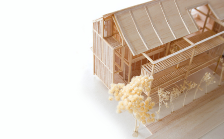 close up shot wood home model on white background dream conceptの写真素材