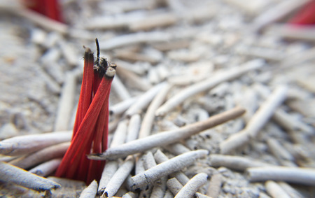 close up macro incense after burn on sand for pray to Buddhaの写真素材