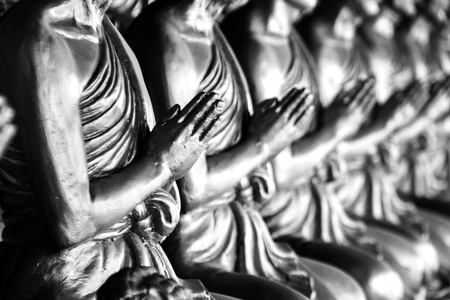 close up many hand of statue monk in buddhism temple in roolの写真素材