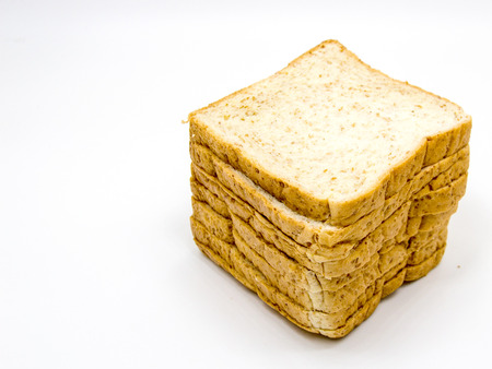 hole wheat bread on white background