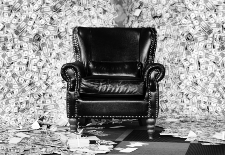 luxuary leather sofa seat in money mountain rich man conceptの写真素材