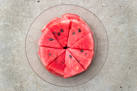 close up slide watermelon on dish and concept street food in thaiの写真素材