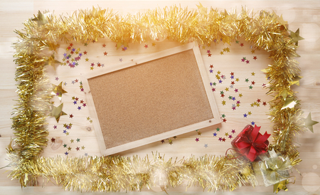 celebrate frame with froid fur and gift present box on wood plate and photo frame for backgroundの写真素材