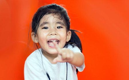 select focus face asian Thai girl smile and fun on white background