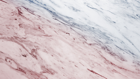 close up surface white stone with blue and red tone backgroundの写真素材