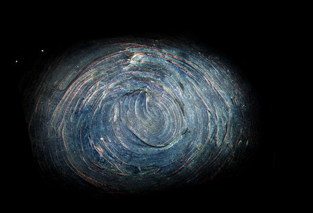 abstract cement pattern with universe color like eye or cyclone shape in dark light