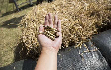 gold used blank bullet on hand at bunker