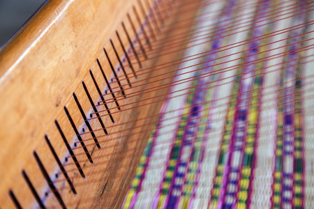 wood plate matchine to lock string for made rattan mat in Thailand handmade productの写真素材