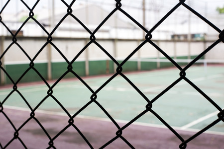 focus silhouette net with blur old tennis court for sport gameの写真素材