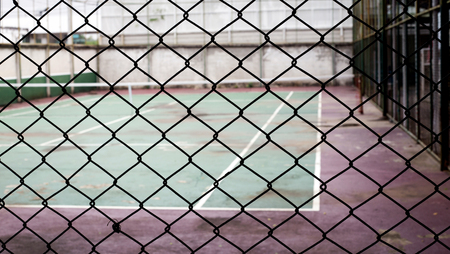 focus silhouette net with blur old tennis court for sport gameの写真素材