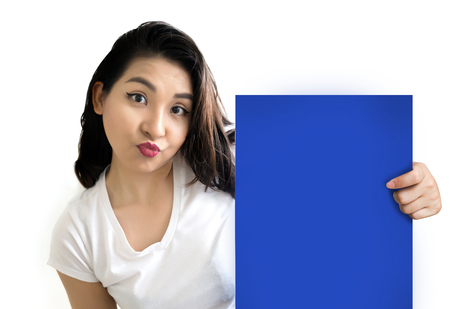 cute asian woman show blank banner on white isolate for displayの写真素材