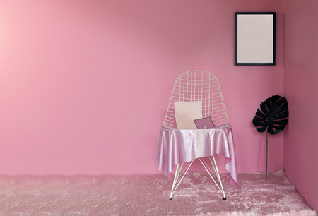 pink theme decoration living room in lady concept with white net chair ,pink carpet ,photo frame and big leaf pastel mood in corner for relaxの写真素材