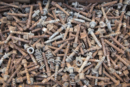 old rusty nail and screw retire from railway use for backgroundの写真素材