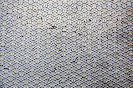 close up old and dirty grey steel net shape backgroundの写真素材