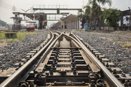 focus iron line of railway for train transportation in to next train station on travel dayの写真素材