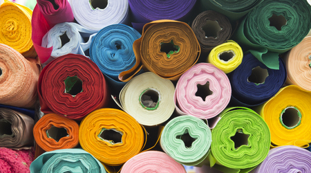 colourful fabric texture for raw mate to make fashion dress. Grossy fabric in favric shop for backgroundの写真素材