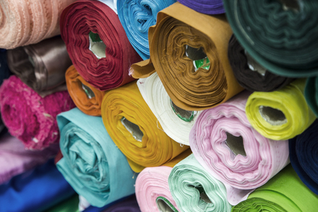 colourful fabric texture for raw mate to make fashion dress. Grossy fabric in favric shop for backgroundの写真素材