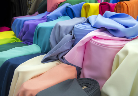 colourful fabric texture for raw mate to make fashion dress. Grossy fabric in favric shop for backgroundの写真素材