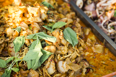 close up spicy curry pork fried with ginger and herb of Thai food.の写真素材