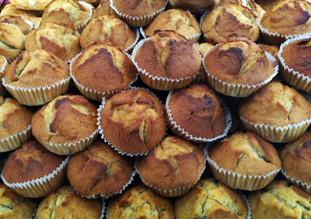 close up banana cup cake bakery backgroundの写真素材