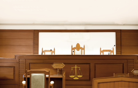 courtroom attastor talking to magistrate in court. The law adjustment conceptの写真素材