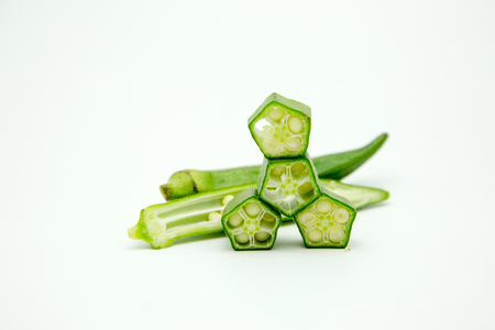 green Okra slice on white isolated. good health from herb ingredient from okra.の写真素材