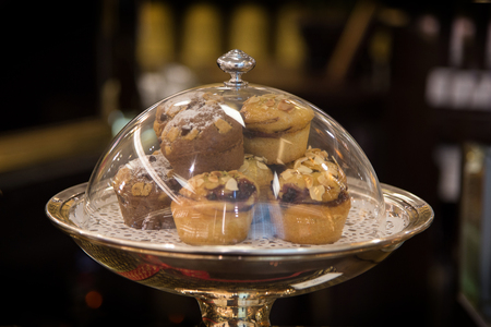 close up handmade cookies on plate ready to serve on black backgroundの写真素材