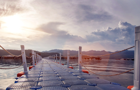 floating walk way on water to travel roomの写真素材