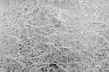 close up foil silver texture backgroundの写真素材