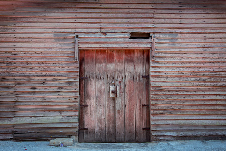 vintage wood cabin building door near exterior backgroundの写真素材