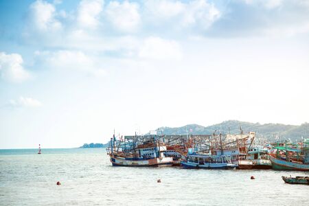 fisherman boat and transportation in seafood industry at seashoreの写真素材